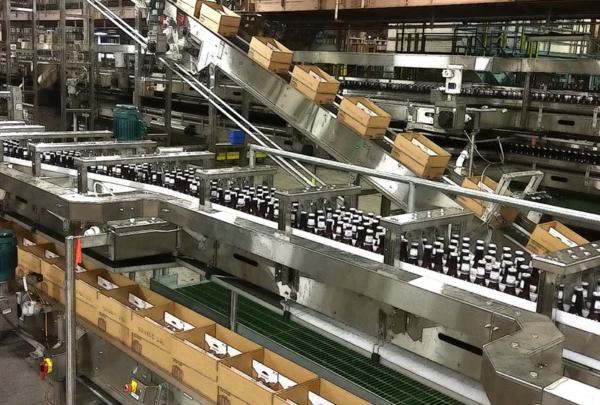 Bottles and boxes on packaging line.